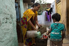 WP in Ahmedabad, India with child. Photo by Paula Bronstein